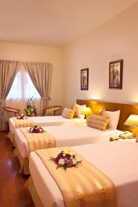 Classic Triple Room room in Landmark Plaza Hotel