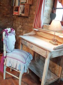 Maisons de vacances La Pinay - Une petite maison cosy avec spa & cheminee : photos des chambres