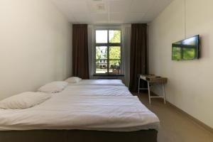 Triple Room with Shared Bathroom room in Hostel Lidköping