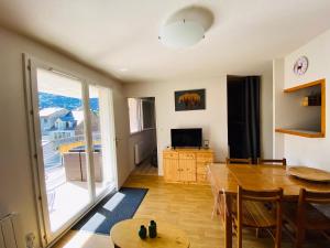 Appartements La Marmotaine, T2 bis, Parking prive, Balcon vue montagne : photos des chambres