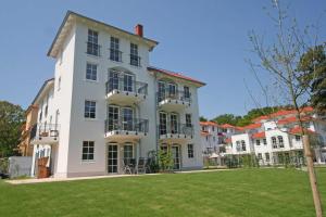 Haus Meeresblick Ferienwohnung Dunenblick mit Terrasse