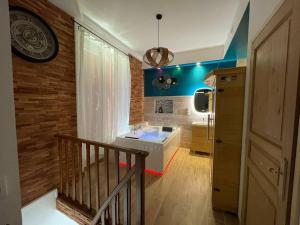 Appartements Suite d'amour et detente jacuzzi, sauna et massage : photos des chambres