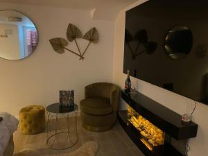 Appartements Suite d'amour et detente jacuzzi, sauna et massage : photos des chambres