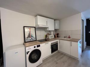 Appartements Le Poincare, a 1 min de la gare : photos des chambres