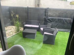 Appartements T2 avec jardin au calme climatise : photos des chambres