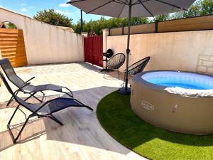 Maisons de vacances Maison de charme avec Jacuzzi : photos des chambres