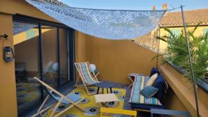 Maisons de vacances L'ENTRE POTES - Maison de caractere dans un village pittoresque avec garage : photos des chambres