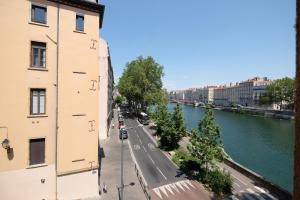 Appartements HONORE SUITE VUE SAONE : photos des chambres