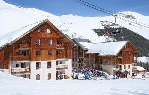 Appartements travelski home select - Residence L'Oree des Pistes 3 stars : photos des chambres