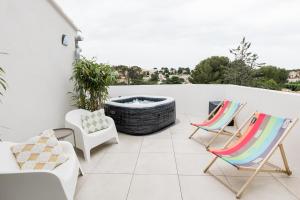 Appartements Les Calanques - Clim et Jacuzzi : photos des chambres