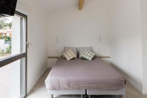 Appartements Les Calanques - Clim et Jacuzzi : photos des chambres