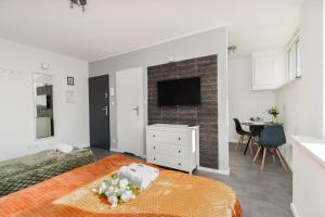 Comfy & Sunny Apartments Głogowska by Renters