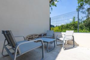 Appartements Le Cri de la Chouette - Appt avec terrasse : photos des chambres