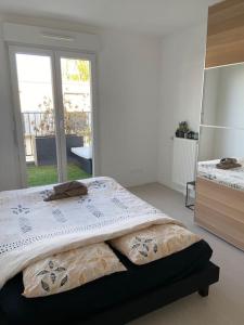 Appartements Duplex a 15min de Paris : photos des chambres