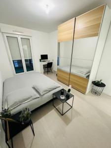 Appartements Duplex a 15min de Paris : photos des chambres