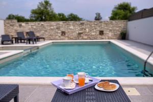 Luksuzni Apartmani Asi s bazenom