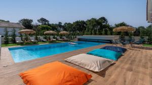 Maisons de vacances Villa Hakuna Matata - 4 etoiles climatisee avec piscine : photos des chambres