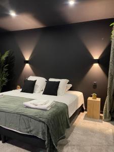 Appartements Spa & Love Exotic - Balneo - Sauna - Parking : photos des chambres