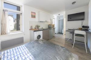 Appartements Le Thabor - Studio confortable : photos des chambres