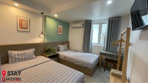 Phòng 2 Giường Đơn Với Phòng Tắm Riêng (Twin Room with Private Bathroom)