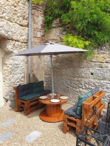 Appartements La Grotte du Bonheur : photos des chambres