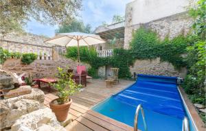 Maisons de vacances Nice Home In Montbazin With Outdoor Swimming Pool, Wifi And 2 Bedrooms : photos des chambres