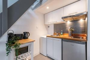 Appartements Vieux Lille triplex : photos des chambres