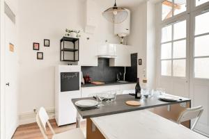 Appartements Charmant 2 pers atypique avec terrasse-metro Valmy : photos des chambres