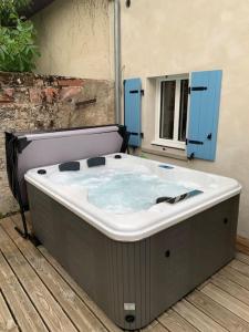 Maisons de vacances La petite maison de Justin - Jacuzzi privatif : photos des chambres