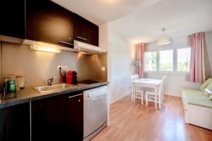 Appartements L-Ile dOr - Appt climatise avec piscine partagee : photos des chambres