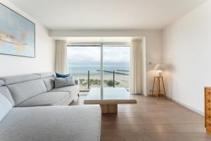 Zeedijk app met panoramisch uitzicht op pier - 6p