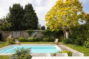 Maisons de vacances La Villa des Rochettes - Charmante maison avec piscine et jardin : photos des chambres