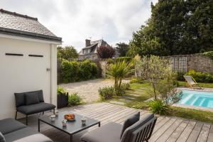 Maisons de vacances La Villa des Rochettes - Charmante maison avec piscine et jardin : photos des chambres