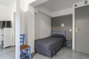 Hotels Hotel Les Palmiers En Camargue : photos des chambres