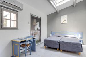 Hotels Hotel Les Palmiers En Camargue : photos des chambres