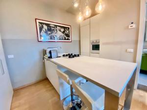 GuestHost - Viale Umbria White & Cosy Studio