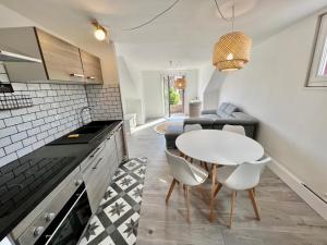 Appartements Un peu plus pret des etoiles : photos des chambres