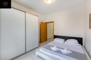 Modern & private 1BR APT in the Heart of Paceville by 360 Estates