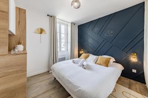 Appartements L'Hermes - Charmant appartement moderne et cosy : photos des chambres