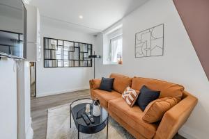 Appartements L'Hermes - Charmant appartement moderne et cosy : photos des chambres