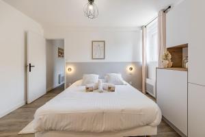 Appartements L'Hermes - Charmant appartement moderne et cosy : photos des chambres