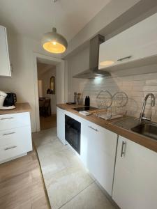 Appartements WALLIS YourHostHelper : photos des chambres