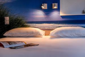 Hotels Les Vagues Hotel Restaurant : photos des chambres