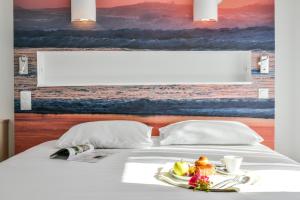 Hotels Les Vagues Hotel Restaurant : photos des chambres
