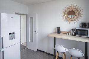 Appartements Evasion Urbaine - Vue Panoramique - Proche gare : photos des chambres