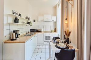 STUDIO3 zentral und ruhig mit Parkplatz, 5 min z Bali-T und GOP, Boxspringbett
