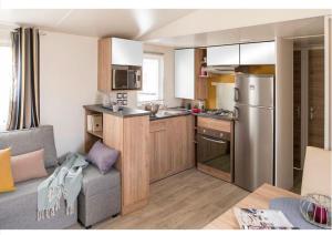 Appartements Mobil home 6-8 personnes Camping de dugny a ONZAIN : photos des chambres