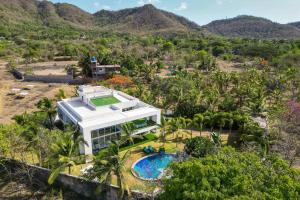 Villa Capri by StayVista - Featuring a swimming pool, mountain view and snooker table