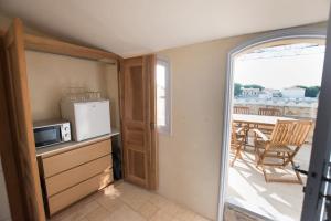 Maisons de vacances Rhona, Terrasse vue sur le Rhone : photos des chambres