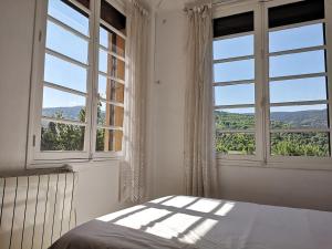 Maisons de vacances Casa adosada con gran jardin en Osseja : photos des chambres